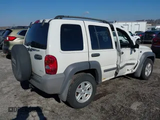 2004 Jeep Liberty Sport with VIN 1J4GL48K24W303510, listed as a IAAI auction lot 41660788 with 178,067 mi miles. Bid and sale history available at carsss.com. Image 4.