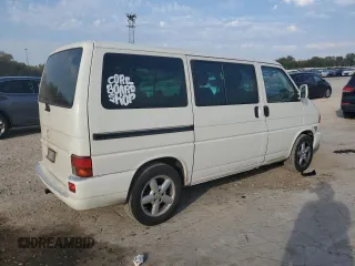 2002 Volkswagen EuroVan с VIN WV2KB47072H018503, выставлен на аукционе Copart как лот 75546724 с пробегом 179 688 миль миль и Списание • Salvage title. История ставок и продаж доступна на DreamBid. Изображение 3.