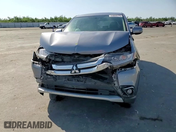 2018 Mitsubishi Outlander ES z VIN JA4AZ3A34JJ003445, wystawiony jako Copart lot #55850775 z przebiegiem 133 644 mil mil oraz Szkoda całkowita • Salvage title. Historia ofert i sprzedaży dostępna na DreamBid. Obrazek 14.