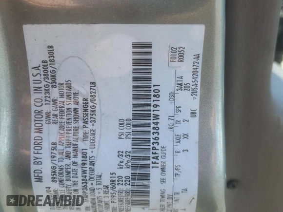 2004 Ford Focus SE with VIN 1FAFP36384W191801, listed as a Copart auction lot 63661465 with 144,226 mi miles and Salvage title. Bid and sale history available at DreamBid. Image 12.