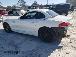 2011 BMW Z4 sDrive30i with VIN WBALM5C5XBE379064, listed as a Copart auction lot 87475414 with 105,420 mi miles and Salvage Title. Bid and sale history available at carsss.com. Image 2.
