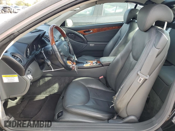 2005 Mercedes-Benz SL 500 with VIN WDBSK75F95F100318, listed as a Copart auction lot 50427245 with 80,320 mi miles and Salvage Title. Bid and sale history available at DreamBid. Image 7.