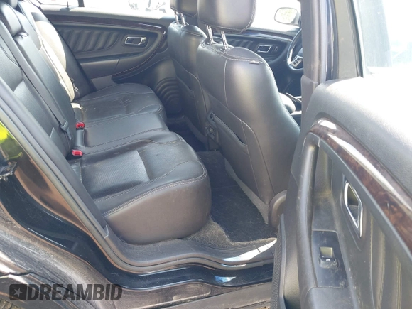2015 Ford Taurus Limited с VIN 1FAHP2J88FG118169, выставлен на аукционе IAAI как лот 42531731 с пробегом 194 736 миль миль и . История ставок и продаж доступна на DreamBid. Изображение 8.