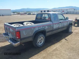 1992 Dodge Dakota with VIN 1B7GG23X9NS683519, listed as a IAAI auction lot 42217984 with 178,152 mi miles and . Bid and sale history available at carsss.com. Image 4.