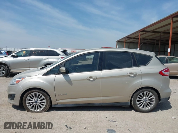 2018 Ford C-Max SE with VIN 1FADP5AU8JL102227, listed as a IAAI auction lot 42062394 with 122,943 mi miles. Bid and sale history available at carsss.com. Image 14.