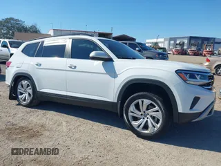 2021 Volkswagen Atlas SE with VIN 1V2JP2CAXMC560708, listed as a IAAI auction lot 41532784 with 82,532 mi miles and . Bid and sale history available at DreamBid. Image 1.