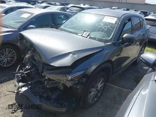 2020 Mazda CX-5 Grand Touring with VIN JM3KFADM7L0766278, listed as a IAAI auction lot 41297902 with 1 mi miles. Bid and sale history available at carsss.com. Image 22.