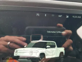 2022 Rivian R1T Adventure Package with VIN 7FCTGAAA8NN012505, listed as a Copart auction lot 72496734 with 5,916 mi miles and Salvage Title. Bid and sale history available at carsss.com. Image 9.