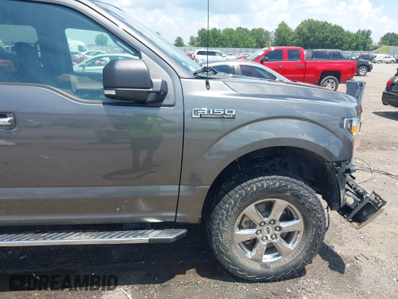 2019 Ford F-150 XL with VIN 1FTEW1E52KKE98899, listed as a IAAI auction lot 42576904 with 168,223 mi miles and . Bid and sale history available at DreamBid. Image 22.