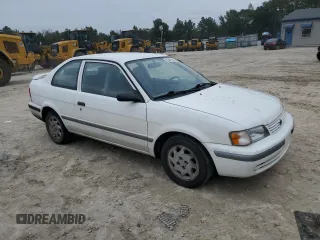 1998 Toyota Tercel DX z VIN JT2AC52L2W0307400, wystawiony jako Copart lot #80497644 z przebiegiem 72 167 mil mil oraz Czysty tytuł • Clean title. Historia ofert i sprzedaży dostępna na DreamBid. Obrazek 4.