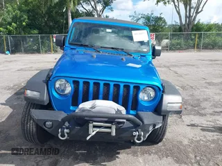 2022 Jeep Wrangler Unlimited Sport with VIN 1C4HJXDG3NW117155, listed as a IAAI auction lot 40240879 with 36,323 mi miles and . Bid and sale history available at DreamBid. Image 12.