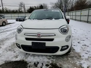 2016 FIAT 500X Lounge z VIN ZFBCFYDT2GP365900, wystawiony jako Copart lot #44891615 z przebiegiem 129 299 mil mil oraz Szkody całkowita. Historia ofert i sprzedaży dostępna na DreamBid. Obrazek 11.