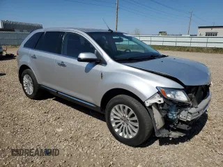 2013 Lincoln MKX z VIN 2LMDJ8JK1DBL36192, wystawiony jako Copart lot #56359355 z przebiegiem 132 913 mil mil oraz Szkoda całkowita • Salvage title. Historia ofert i sprzedaży dostępna na DreamBid. Obrazek 4.