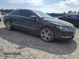 2014 Volkswagen CC R-Line with VIN WVWBP7AN4EE527959, listed as a Copart auction lot 47198775 with 113,804 mi miles and Clean Title. Bid and sale history available at carsss.com. Image 4.