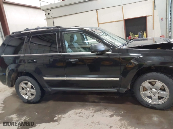 2007 Jeep Grand Cherokee Limited with VIN 1J8HR58287C572544, listed as a IAAI auction lot 41366475 with 231,151 mi miles. Bid and sale history available at carsss.com. Image 13.