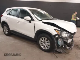 2016 Mazda CX-5 Sport z VIN JM3KE4BY0G0751458, wystawiony jako IAAI lot #42320038 z przebiegiem 40 730 mil mil oraz . Historia ofert i sprzedaży dostępna na DreamBid. Obrazek 1.