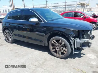 2018 Audi SQ5 Premium Plus z VIN WA1A4AFY1J2008989, wystawiony jako IAAI lot #42249709 z przebiegiem 82 188 mil mil oraz . Historia ofert i sprzedaży dostępna na DreamBid. Obrazek 1.