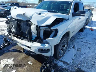 2021 Ram 1500 Limited with VIN 1C6SRFHT5MN548477, listed as a IAAI auction lot 41644894 with 51,429 mi miles and . Bid and sale history available at DreamBid. Image 17.