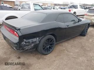 2013 Dodge Challenger SXT z VIN 2C3CDYAGXDH718768, wystawiony jako IAAI lot #41339735 z przebiegiem 187 052 mil mil oraz . Historia ofert i sprzedaży dostępna na DreamBid. Obrazek 4.