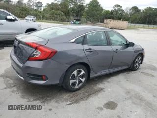 2021 Honda Civic Sedan LX with VIN 2HGFC2F64MH545677, listed as a Copart auction lot 46730155 with 68,299 mi miles and Non Repairable. Bid and sale history available at carsss.com. Image 3.