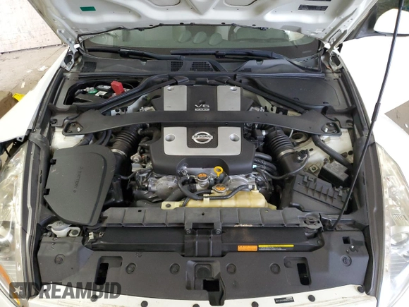 2013 Nissan 370Z Touring z VIN JN1AZ4EH5DM383466, wystawiony jako Copart lot #85704054 z przebiegiem 37 892 mil mil oraz Szkoda całkowita • Salvage title. Historia ofert i sprzedaży dostępna na DreamBid. Obrazek 11.