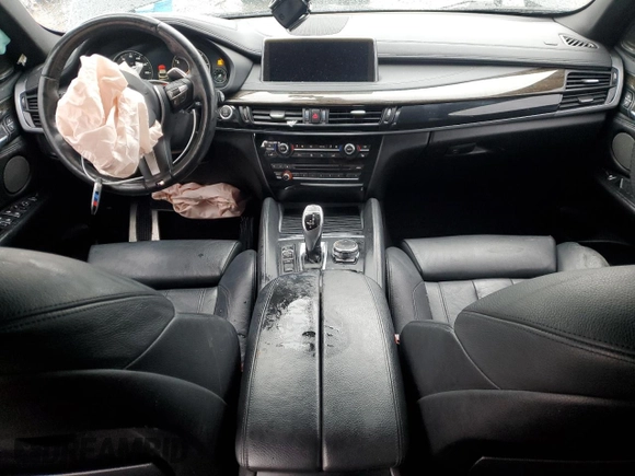 2016 BMW X6 xDrive35i z VIN 5UXKU2C56G0N80105, wystawiony jako Copart lot #46983345 z przebiegiem 99 913 mil mil oraz Szkoda całkowita • Salvage title. Historia ofert i sprzedaży dostępna na DreamBid. Obrazek 8.