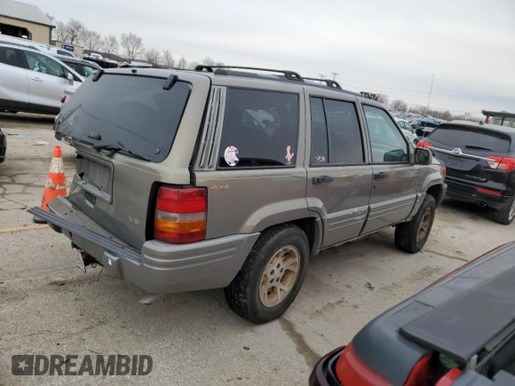 1997 Jeep Grand Cherokee Limited with VIN 1J4GZ78Y3VC568413, listed as a Copart auction lot 86171124 with 104,558 mi miles and Salvage Title. Bid and sale history available at carsss.com. Image 3.