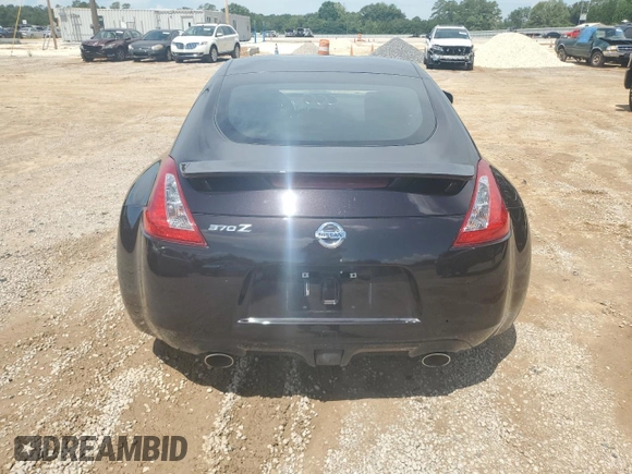 2012 Nissan 370Z Touring with VIN JN1AZ4EH9CM561796, listed as a Copart auction lot 60938314 with 59,011 mi miles and Salvage Title. Bid and sale history available at carsss.com. Image 6.