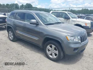 2011 Jeep Grand Cherokee Laredo with VIN 1J4RR4GG3BC595896, listed as a IAAI auction lot 42632333 with 135,426 mi miles and . Bid and sale history available at DreamBid. Image 1.