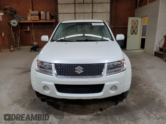 2012 Suzuki Grand Vitara Premium z VIN JS3TD0D66C4100845, wystawiony jako Copart lot #53454565 z przebiegiem 106 415 mil mil oraz Szkoda całkowita • Salvage title. Historia ofert i sprzedaży dostępna na DreamBid. Obrazek 5.