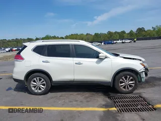 2016 Nissan Rogue S with VIN KNMAT2MT7GP604822, listed as a IAAI auction lot 41928614 with 95,596 mi miles and . Bid and sale history available at DreamBid. Image 13.