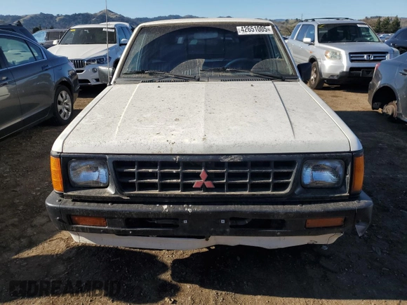 1990 Mitsubishi Mighty Max z VIN JA7FL24W3LP007688, wystawiony jako Copart lot #42651005 z przebiegiem 265 379 mil mil oraz Tytuł czysty. Historia ofert i sprzedaży dostępna na DreamBid. Obrazek 5.