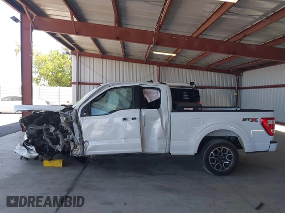 2023 Ford F-150 XL with VIN 1FTEX1CP1PKE18310, listed as a IAAI auction lot 42337133 with 26,931 mi miles and . Bid and sale history available at DreamBid. Image 14.