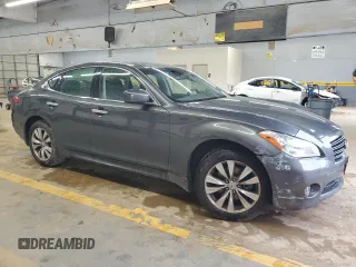 2013 Infiniti M with VIN JN1BY1AR3DM603157, listed as a Copart auction lot 73196754 with 77,332 mi miles and Salvage Title. Bid and sale history available at DreamBid. Image 4.