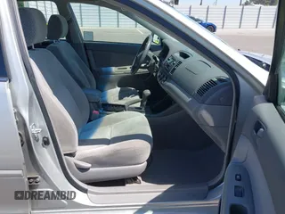 2004 Toyota Camry LE with VIN 4T1BE32K74U300025, listed as a IAAI auction lot 42035954 with 115,203 mi miles. Bid and sale history available at carsss.com. Image 5.