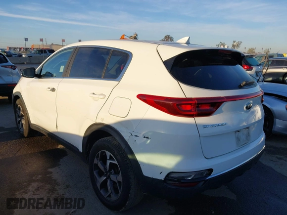2020 Kia Sportage LX with VIN KNDPM3AC2L7733689, listed as a IAAI auction lot 41858043 with 93,979 mi miles and . Bid and sale history available at DreamBid. Image 3.
