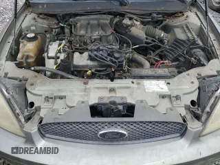 2004 Ford Taurus SE with VIN 1FAFP53274A193186, listed as a Copart auction lot 60255125 with 184,493 mi miles and Salvage title. Bid and sale history available at DreamBid. Image 11.
