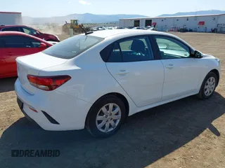 2022 Kia Rio S with VIN 3KPA24AD2NE473968, listed as a IAAI auction lot 42170326 with 42,676 mi miles and . Bid and sale history available at DreamBid. Image 4.