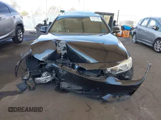 2014 BMW 4 Series 428i with VIN WBA3N7C51EK220125, listed as a IAAI auction lot 41881928 with 129,810 mi miles and . Bid and sale history available at carsss.com. Image 13.