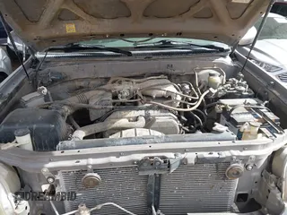2000 Toyota Tundra SR5 with VIN 5TBRN3415YS049029, listed as a IAAI auction lot 41731441 with 202,100 mi miles and . Bid and sale history available at DreamBid. Image 10.