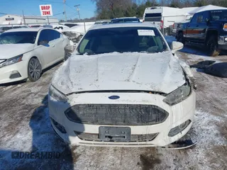 2013 Ford Fusion SE Hybrid with VIN 3FA6P0LU8DR272165, listed as a IAAI auction lot 41333539 with 196,843 mi miles. Bid and sale history available at carsss.com. Image 11.