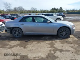 2014 Chrysler 300 with VIN 2C3CCAGG7EH255782, listed as a IAAI auction lot 41689454 with 148,912 mi miles. Bid and sale history available at carsss.com. Image 13.