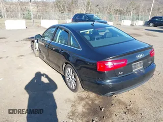 2014 Audi A6 Premium Plus z VIN WAUFGAFC5EN133941, wystawiony jako IAAI lot #41835479 z przebiegiem 68 911 mil mil oraz . Historia ofert i sprzedaży dostępna na DreamBid. Obrazek 3.