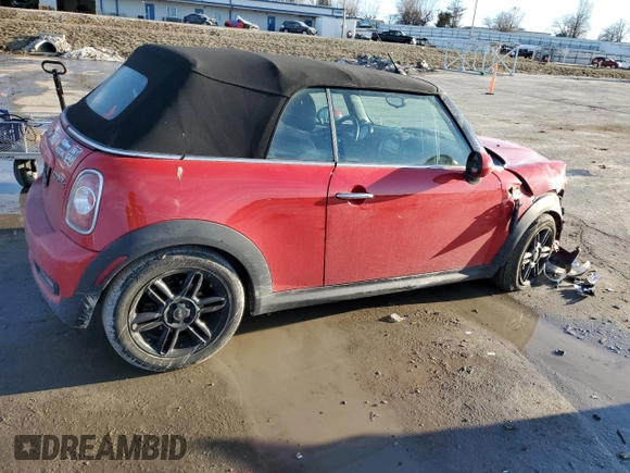 2015 MINI Convertible S с VIN WMWZP3C57FT299177, выставлен на аукционе Copart как лот 43277825 с пробегом 79 454 миль миль и Списание • Salvage title. История ставок и продаж доступна на DreamBid. Изображение 3.