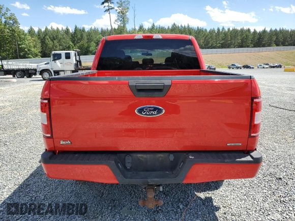 2019 Ford F-150 XL with VIN 1FTEW1E43KKE28982, listed as a Copart auction lot 58302285 with 101,707 mi miles and Salvage title. Bid and sale history available at DreamBid. Image 6.