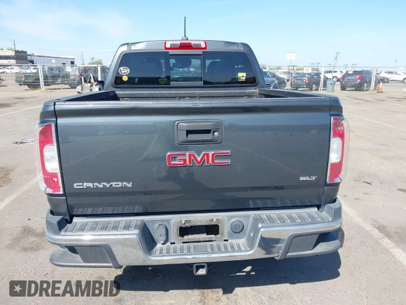 2016 GMC Canyon 4WD SLT with VIN 1GTP6DE15G1323650, listed as a IAAI auction lot 42097101 with 240,662 mi miles. Bid and sale history available at carsss.com. Image 16.