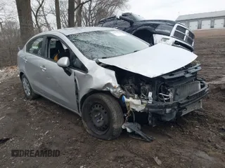 2014 Kia Rio LX with VIN KNADM4A32E6331900, listed as a IAAI auction lot 41551370 with 205,594 mi miles. Bid and sale history available at carsss.com. Image 1.
