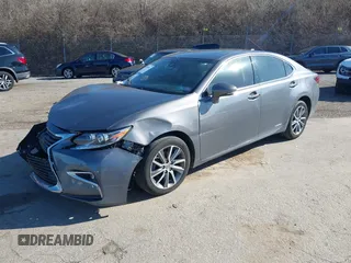 2017 Lexus ES 300h with VIN JTHBW1GG7H2145843, listed as a IAAI auction lot 41860553 with 129,906 mi miles and . Bid and sale history available at DreamBid. Image 2.
