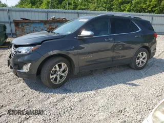 2019 Chevrolet Equinox Premier z VIN 2GNAXXEV4K6133861, wystawiony jako Copart lot #60614425 z przebiegiem 135 005 mil mil oraz Szkoda całkowita • Salvage title. Historia ofert i sprzedaży dostępna na DreamBid. Obrazek 1.