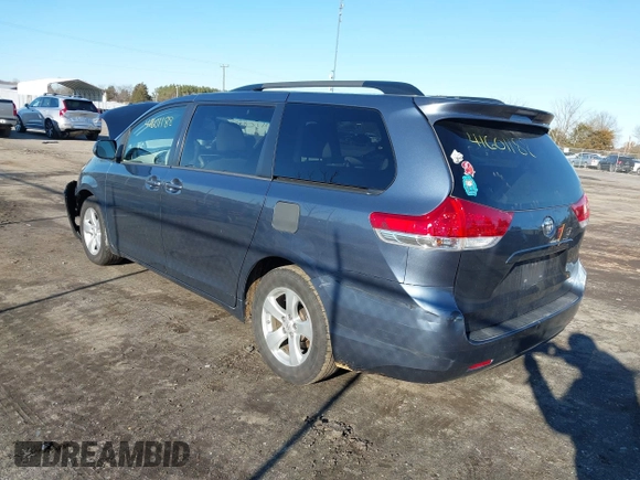 2014 Toyota Sienna LE AAS with VIN 5TDKK3DC4ES514981, listed as a IAAI auction lot 41601188 with 164,963 mi miles and . Bid and sale history available at DreamBid. Image 3.